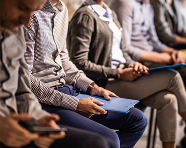 Job candidates sitting in a row